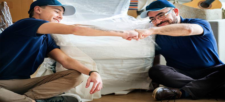 one of residential movers Dallas–Fort Worth metroplex packing things in loving room