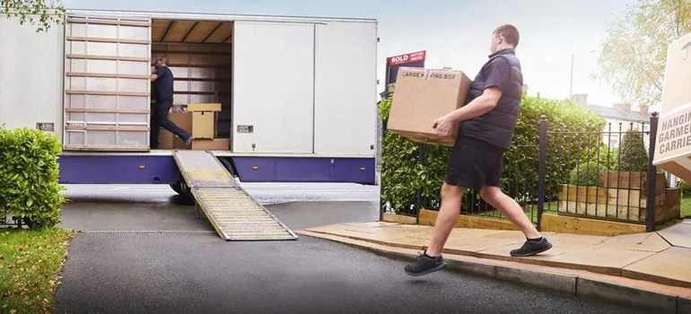 LA movers lifting items into a truck