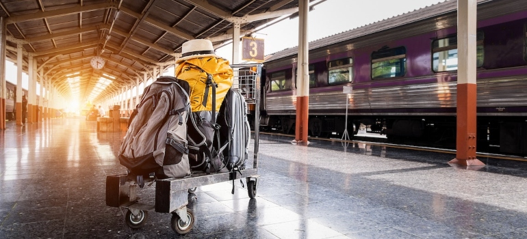 packed suitcases at the train station for leaving Dallas–Fort Worth metroplex