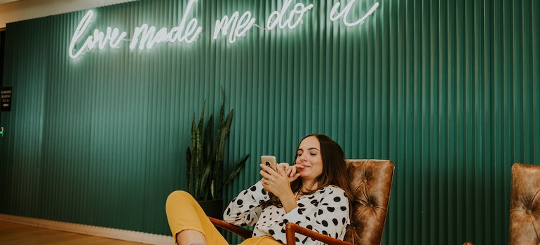 A woman reading about 7 Best Neighborhoods to live in Houston